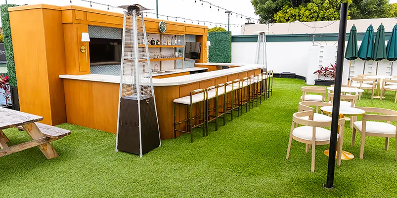 Artificial turf cut around paving stones